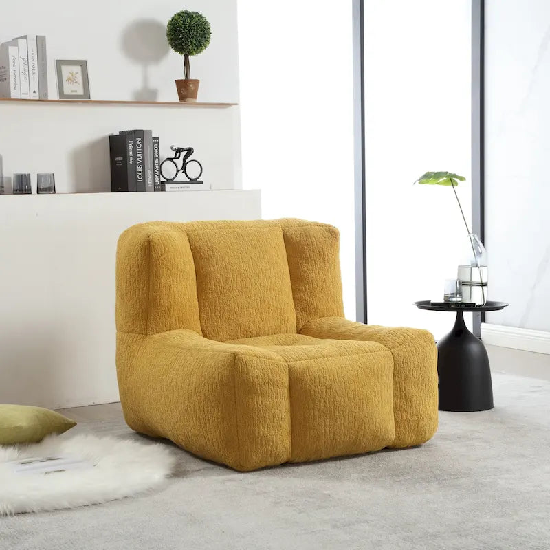 Fauteuil de détente moderne pour chambres à coucher et salles de lecture, conçu pour les adultes.