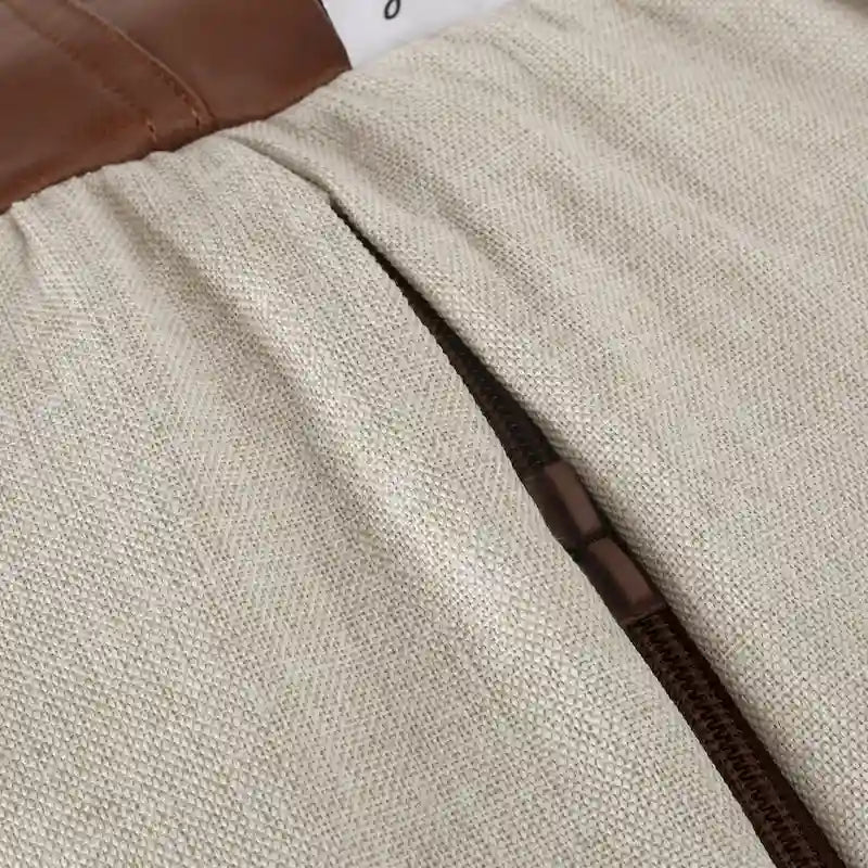 Canapé pouf bicolore en tissu et similicuir de 5 pieds au style moderne.
